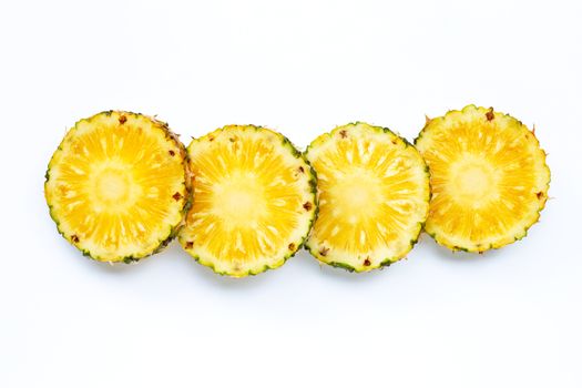 Fresh pineapple slices on white background. Top view