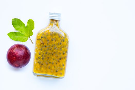 Passion fruit juice on white background. Copy space