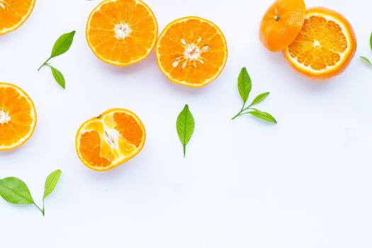 Fresh orange citrus fruit with leaves isolated on white background. 