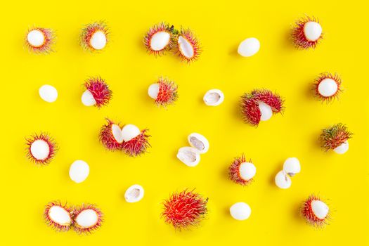 Top view of Rambutan  on yellow background. Copy space
