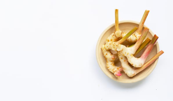 Fresh galangal isolated on white background.