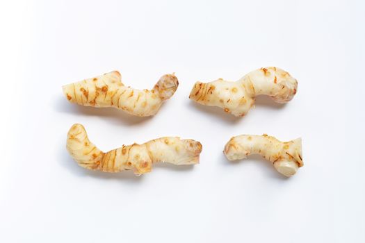 Fresh galangal isolated on white background.