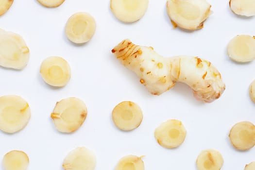 Fresh galangal isolated on white background.