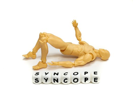 A plastic model and alphabet letters spelling syncope. Medical emergency concept. Isolated on white background.