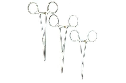 three surgical clamps, isolated on white background, top view, directly above
