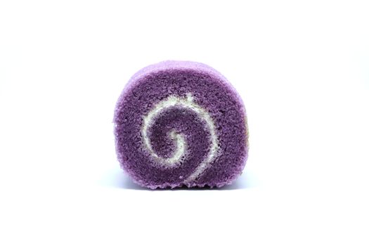 a slice of taro roll cake with sweet creamy filling