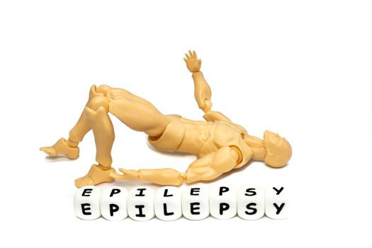 a plastic model and a word epilepsy, a medical condition requiring emergency attention