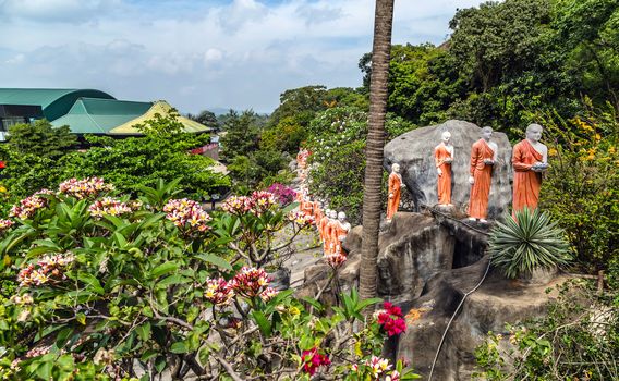 Monk buddhist walking on mountain Sri Lanka, tourist attraction