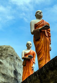 Monk buddhist walking on mountain, tourist attraction Sri Lanka