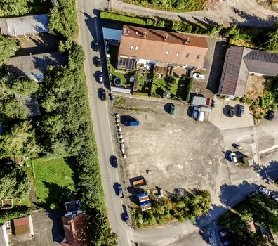 Aerial view of an outdoor warehouse used as a parking space in an industrial operation