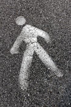 Signal for pedestrians. Road sign on pedestrian asphalt.