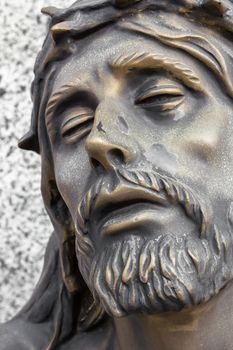Bronze statue of the face of jesus. Ancient sculpture. Ideal for concepts or events like Easter.