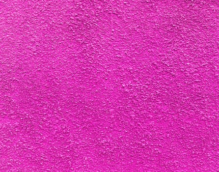 Abstract deep pink wall plastered texture. Rustic background.