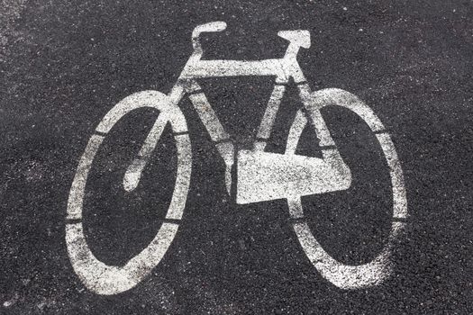 Symbol of bike path imprinted on the asphalt