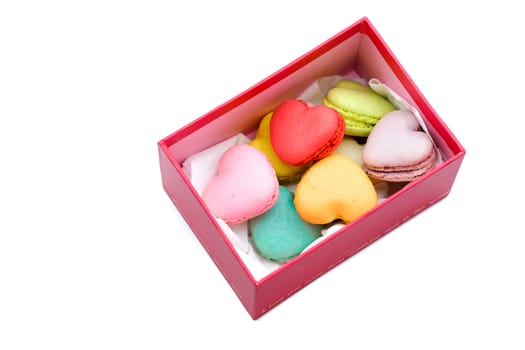 assortments of colorful heart shaped macaroons in a red box, isolated on white background, love, romance, anniversary, marriage, gift, Valentines' Day concept