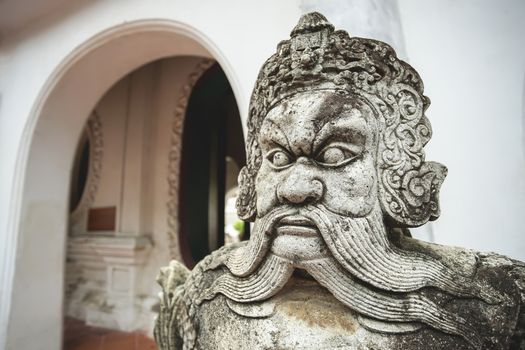 Chinese ancient warrior sculpture in Wat Phra Pathomchedi, Nakhon Pathom Province, Thailand.