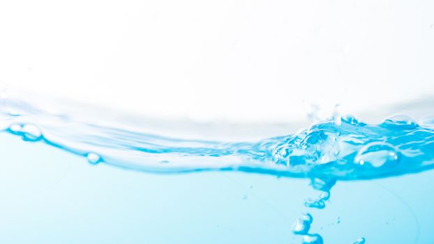 Water splash and ripple isolated on white background