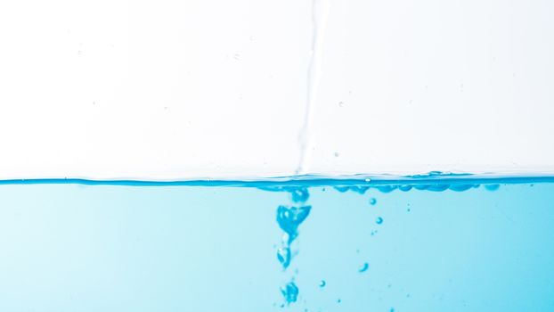 Water splash and ripple isolated on white background