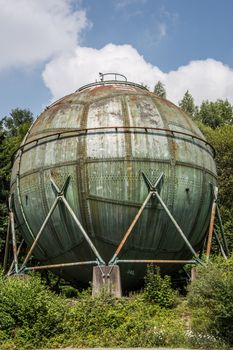 industrial monument as a ball on supports as a former gas tank