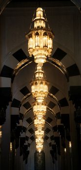 Arcade with lights, large mosque of Muscat, Oman