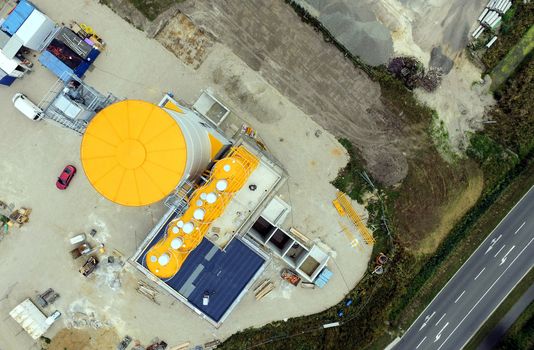 Aerial view of the construction site for a new concrete plant, taken with the drone from a height of seventy meters.