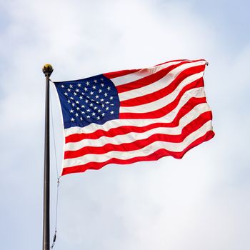 The United States of America flag on a sunny day.