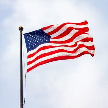 The United States of America flag on a sunny day.