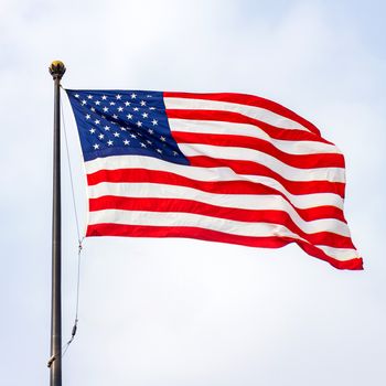 The United States of America flag on a sunny day.