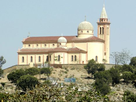 Eritrea, Africa - 08/10/2019: Travelling around the vilages near Asmara and Massawa. An amazing caption of the trees, mountains and some old typical houses with very hot climate in Eritrea.