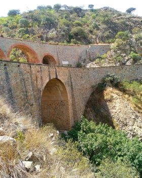 Eritrea, Africa - 08/10/2019: Travelling around the vilages near Asmara and Massawa. An amazing caption of the trees, mountains and some old typical houses with very hot climate in Eritrea.