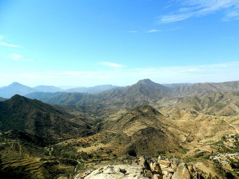 Eritrea, Africa - 08/10/2019: Travelling around the vilages near Asmara and Massawa. An amazing caption of the trees, mountains and some old typical houses with very hot climate in Eritrea.