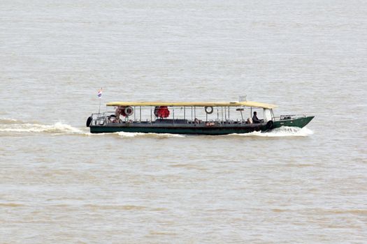 Local fishing boat In the middle of the river