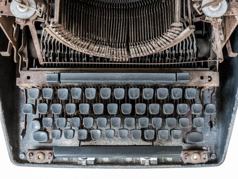 Close up of Antique Typewriter, dirty typewriter letteters isolated on white.