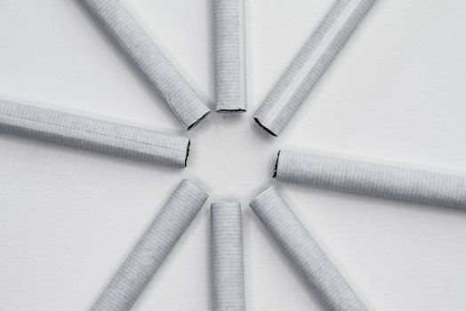 World No Tobacco Day; Sort cigarettes in a circle on grey background.