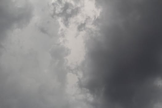 The Dark gray dramatic sky with large clouds in rainy seasons.