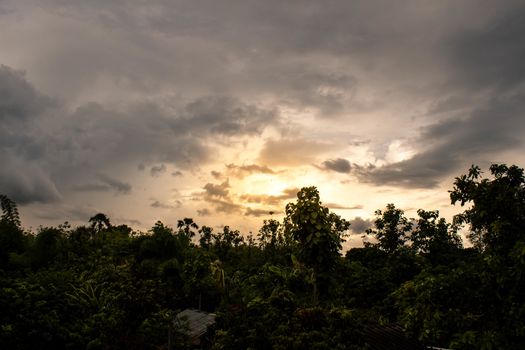 Dark gray dramatic sky with large clouds before rain in evening.