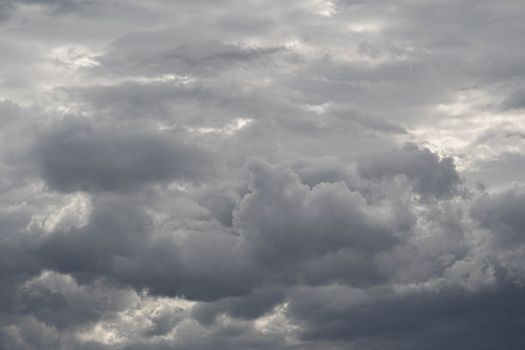 The Dark gray dramatic sky with large clouds in rainy seasons.