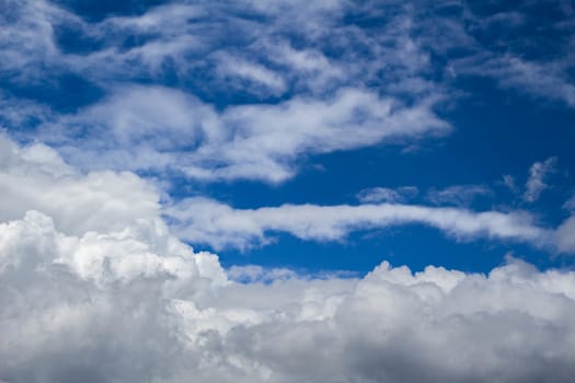 Blue sky with large cloud background.