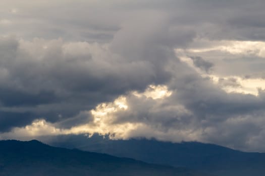 The Dark gray dramatic sky with large clouds in rainy seasons.