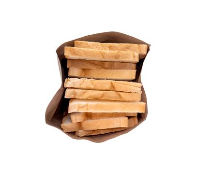 Bread full sliced in paper bag isolated on white background.