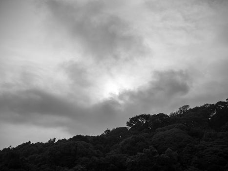 Dark gray dramatic sky with large clouds before rain.