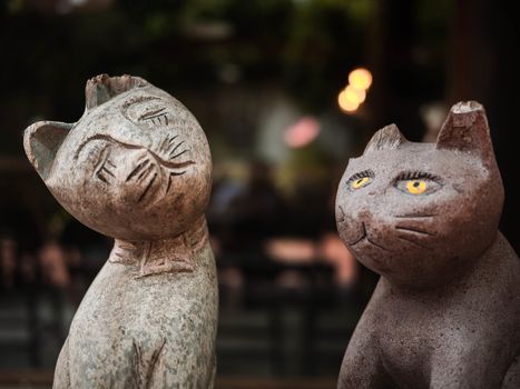 Close​ up​ Old wooden cat carved​​ in​ coffee​ cafe.