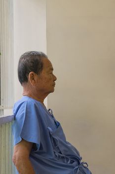Patient elderly waiting a doctor and nurse in hospital