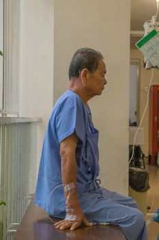 Patient elderly waiting a doctor and nurse in hospital