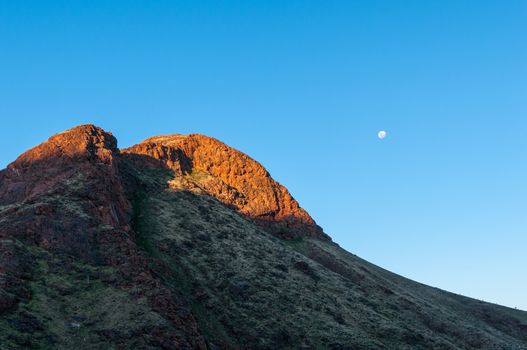 View of part of Brukkaros mountain, an extinct volcano. The moon is visible