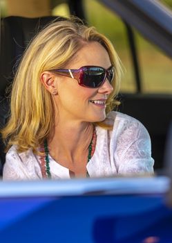 A gorgeous blonde model enjoys a spring day outdoors in the American Southwest