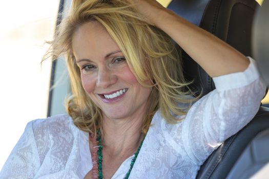 A gorgeous blonde model enjoys a spring day outdoors in the American Southwest