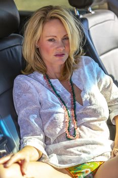 A gorgeous blonde model enjoys a spring day outdoors in the American Southwest