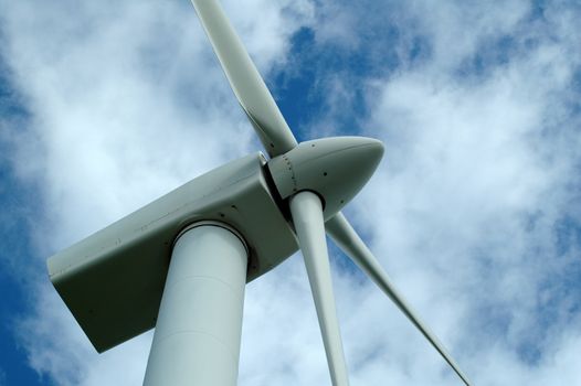 A view of a wind turbine from below