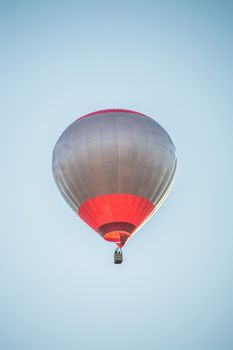 colorful hot air balloon flies in the sky
